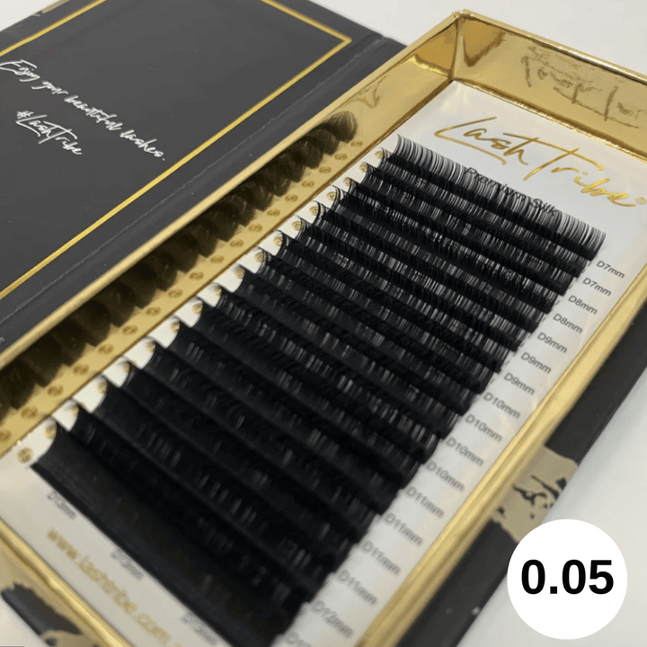 A box of Lash Tribe 0.05 Russian Volume Lashes | Premium Silk | Ultra Black in an eco-friendly black box.