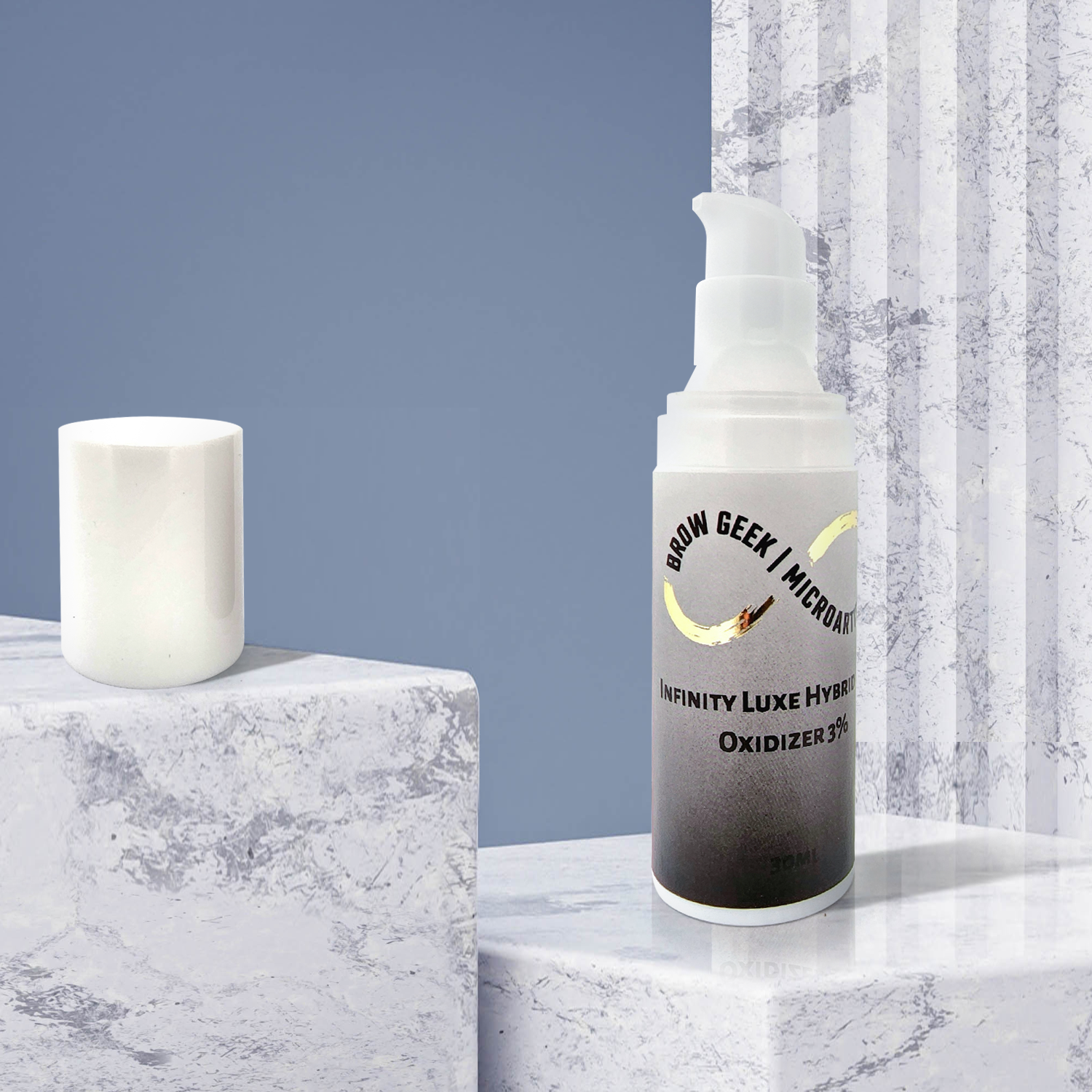 A bottle of INFINITY PUMP DEVELOPER OXIDISER 30ML | Lash Lifting | Brow Tinting Developer by Lash Tribe next to a candle on a marble table.