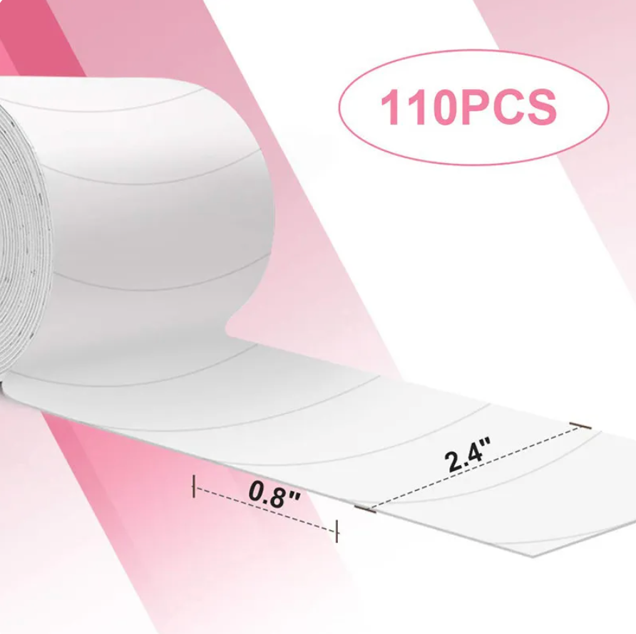 A roll of Lash Tribe white tape with measurements on it.