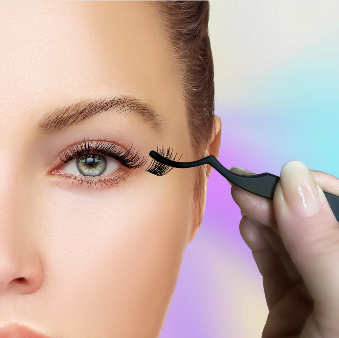 A skilled hand uses the Lash Link Applicator | Lash Segment Tweezer by Lash Link to apply false eyelashes to a woman&