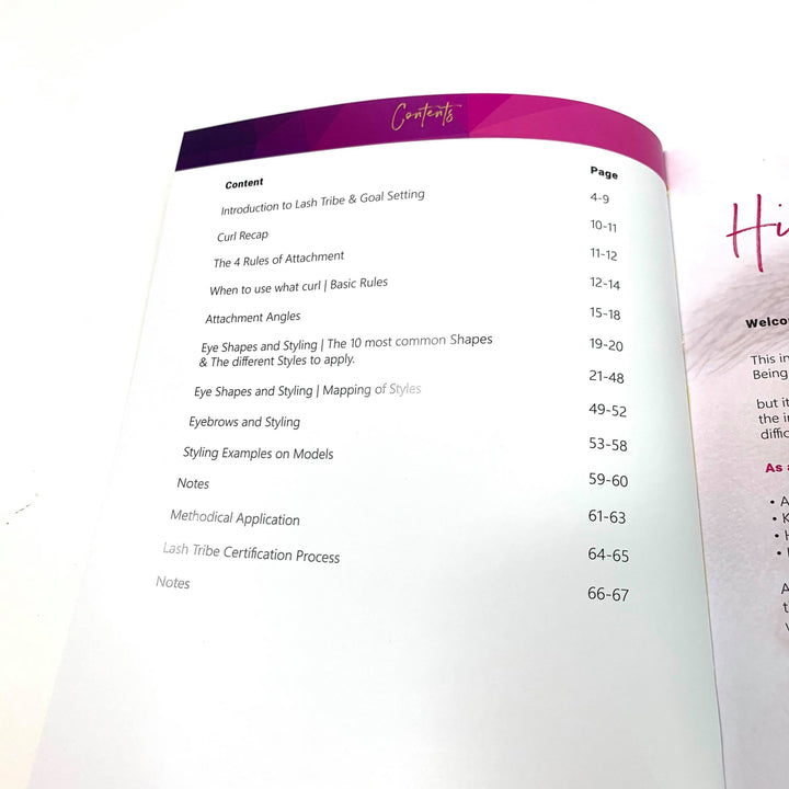 An Eye Shapes &amp; Styling Training | Lash Manual (E-Book) by Lash Tribe with a pink cover is open on a table.