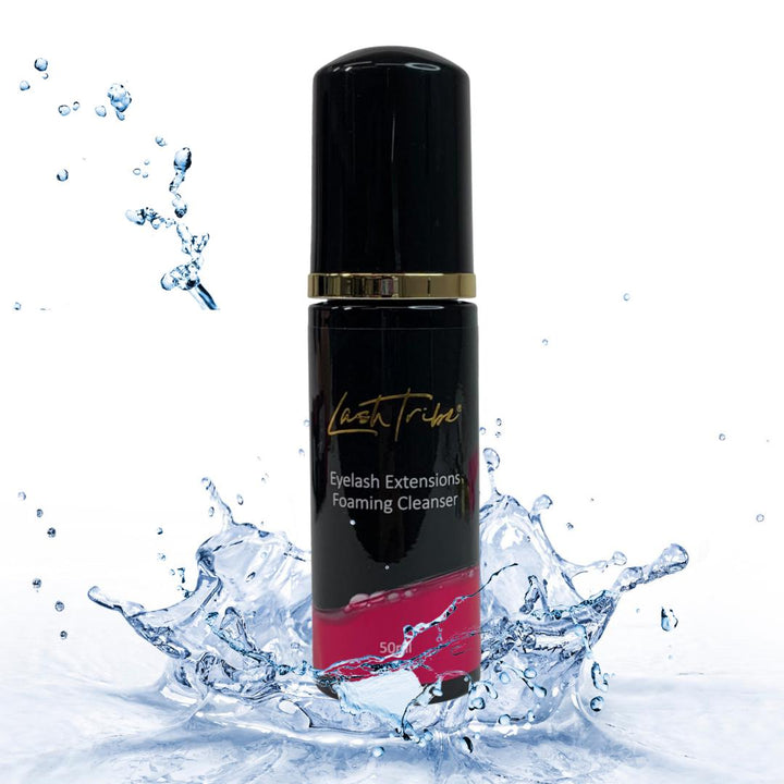 An image of a bottle with Eyelash Extensions Foaming Cleanser from Lash Tribe and a splash of water.