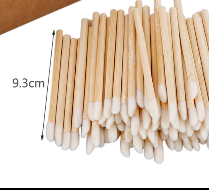 A pile of Lash Tribe Bamboo Lipgloss Wands with measurements.